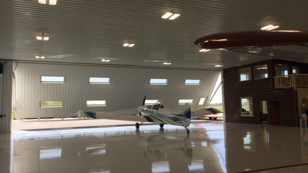 airplane hangar door asi jet