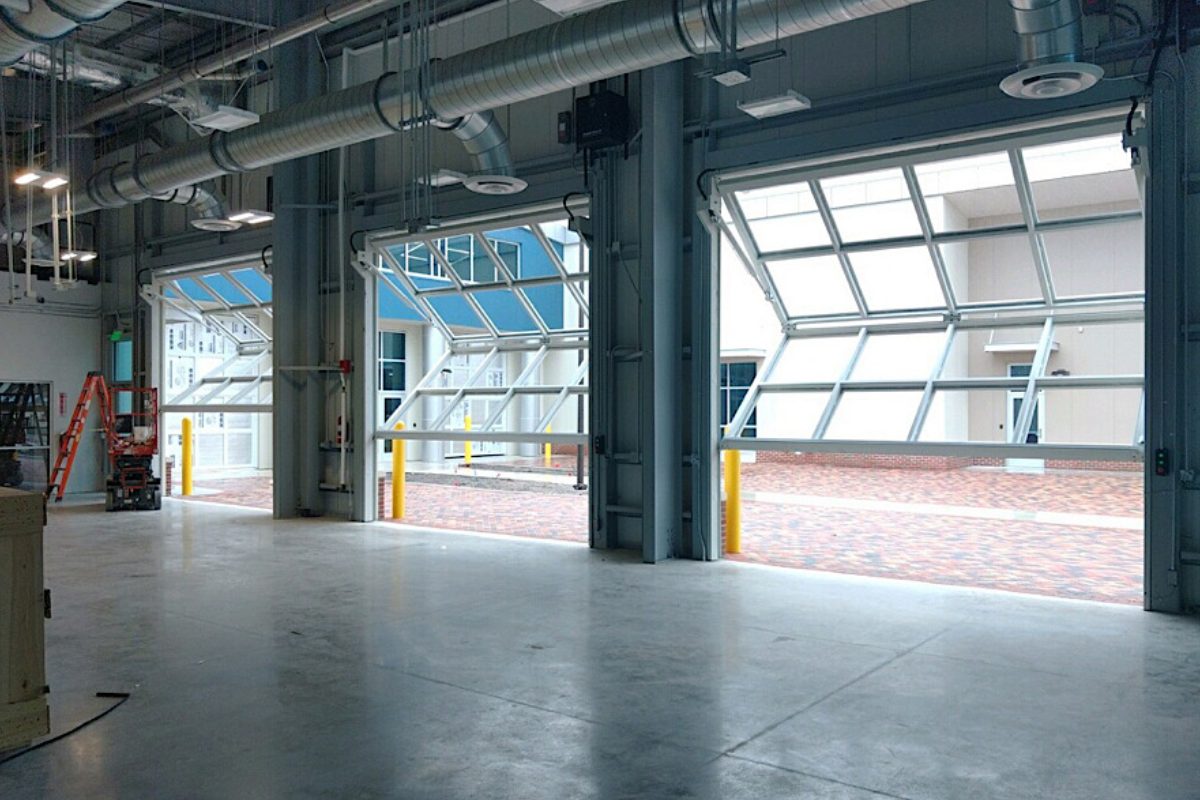 Nineteen bifold hydraulic doors for college Featured Image